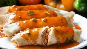 Panqueca de frango recheada e gratinada