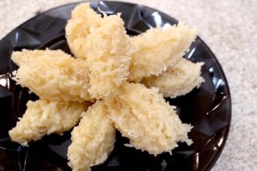 Cocada Cremosa pronta, com pedaços de coco visíveis