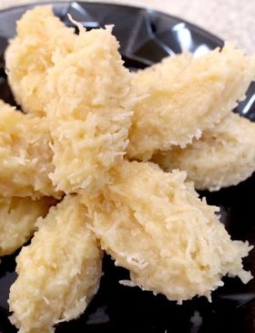 Cocada Cremosa pronta, com pedaços de coco visíveis