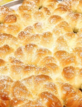 Rosquinha nuvem fofinhas douradas com coco ralado por cima